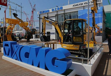 XCMG equipment display at an exhibition stand
