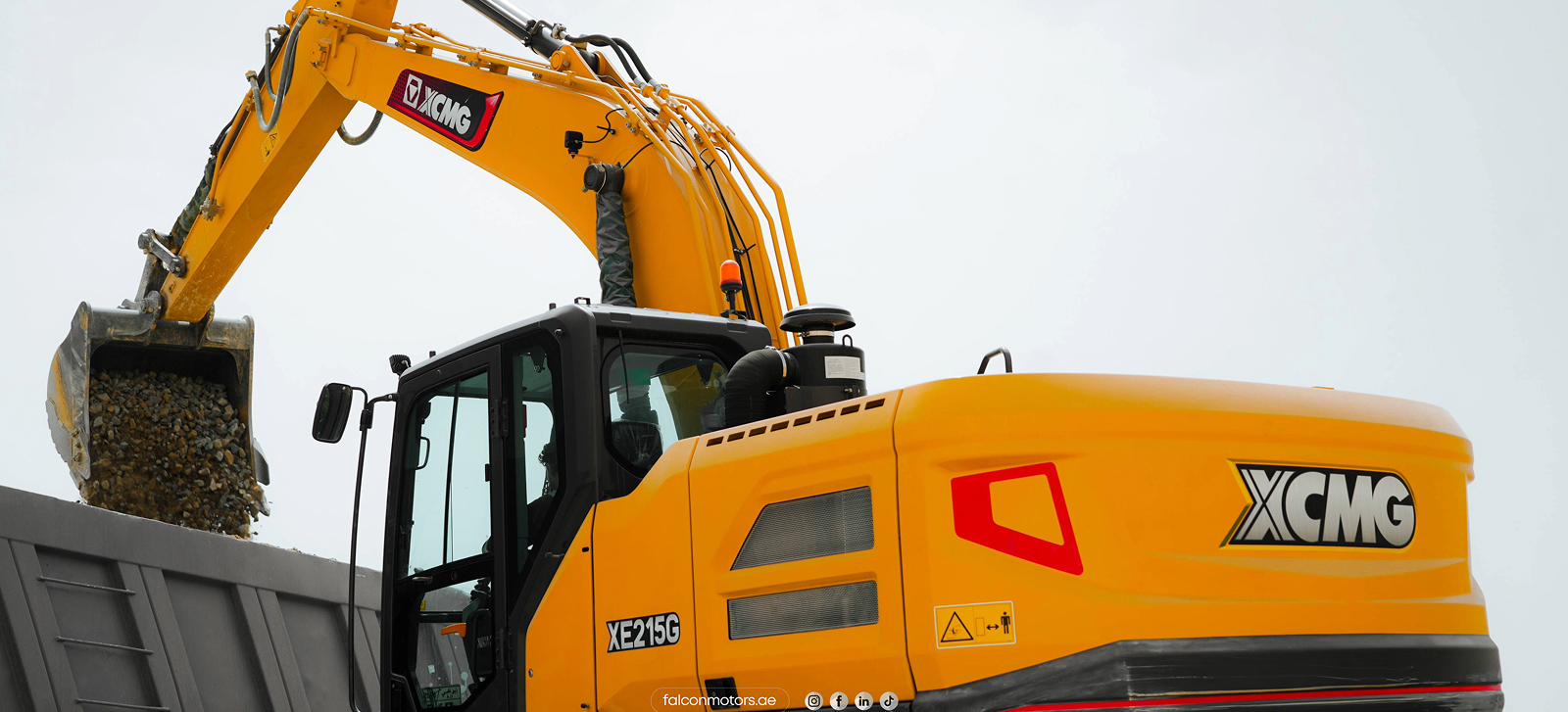 Close view of an XCMG XE215C excavator at work