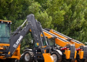Lineup of yellow and black construction equipment