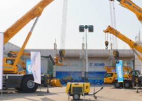 XCMG cranes and equipment at an outdoor service area