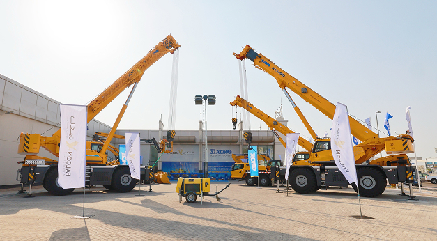 XCMG cranes displayed at an outdoor equipment event